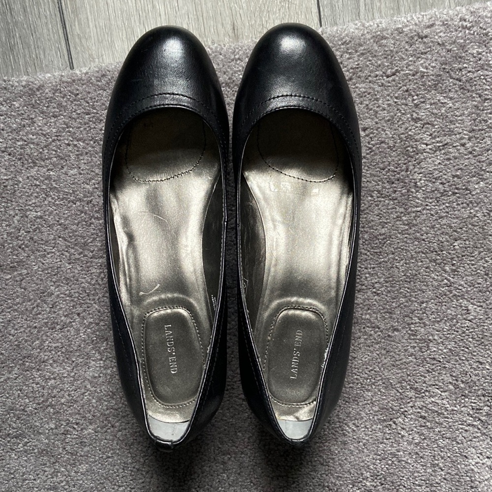 Black leather wedges